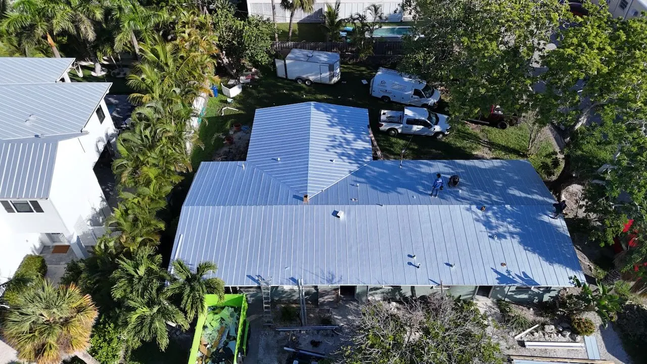 Picture showing after of before and after a metal roof replacement